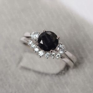 Shop Spinel Rings! Black spinel engagement ring sterling silver round cut stone bridal set ring | Natural genuine Spinel rings, simple unique alternative gemstone engagement rings. #rings #jewelry #bridal #wedding #jewelryaccessories #engagementrings #weddingideas #affiliate #ad