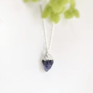 Shop Tanzanite Pendants! Raw Tanzanite Necklace, Raw stone pendant, Raw gemstone Necklace, December Birthstone necklace, Purple crystal necklace, Bohemian necklace | Natural genuine Tanzanite pendants. Buy crystal jewelry, handmade handcrafted artisan jewelry for women.  Unique handmade gift ideas. #jewelry #beadedpendants #beadedjewelry #gift #shopping #handmadejewelry #fashion #style #product #pendants #affiliate #ad
