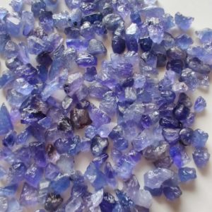 Shop Raw & Rough Tanzanite Stones! 10 Pcs Lot Raw Tanzanite Stone ,Natural Tanzanite, Untreated Rough , Jewelry Making, Healing Stone  4-6mm | Natural genuine stones & crystals in various shapes & sizes. Buy raw cut, tumbled, or polished gemstones for making jewelry or crystal healing energy vibration raising reiki stones. #crystals #gemstones #crystalhealing #crystalsandgemstones #energyhealing #affiliate #ad