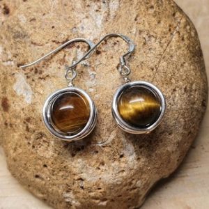 Shop Tiger Eye Earrings! Tiger's eye circle earrings. 925 sterling silver. Dangle drop earrings. Reiki jewelry uk. Capricorn jewelry. 10mm stone | Natural genuine Tiger Eye earrings. Buy crystal jewelry, handmade handcrafted artisan jewelry for women.  Unique handmade gift ideas. #jewelry #beadedearrings #beadedjewelry #gift #shopping #handmadejewelry #fashion #style #product #earrings #affiliate #ad