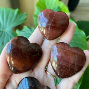 Shop Tiger Eye Shapes! Red Tiger eye heart, Red crystal Heart, protection stone, strength, courage, luck | Natural genuine stones & crystals in various shapes & sizes. Buy raw cut, tumbled, or polished gemstones for making jewelry or crystal healing energy vibration raising reiki stones. #crystals #gemstones #crystalhealing #crystalsandgemstones #energyhealing #affiliate #ad