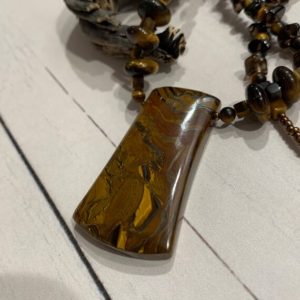 Shop Tiger Iron Pendants! Tiger Iron Pendant on Tiger Eye chips and beads Necklace. | Natural genuine Tiger Iron pendants. Buy crystal jewelry, handmade handcrafted artisan jewelry for women.  Unique handmade gift ideas. #jewelry #beadedpendants #beadedjewelry #gift #shopping #handmadejewelry #fashion #style #product #pendants #affiliate #ad