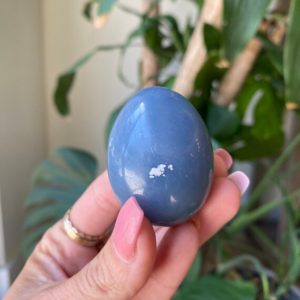 Angelite egg | Natural genuine stones & crystals in various shapes & sizes. Buy raw cut, tumbled, or polished gemstones for making jewelry or crystal healing energy vibration raising reiki stones. #crystals #gemstones #crystalhealing #crystalsandgemstones #energyhealing #affiliate #ad