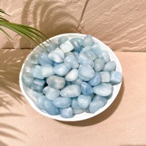 Shop Aquamarine Stones & Crystals! AQUAMARINE: Soothing and Calming Tumbled Aquamarine Crystals for Healing and Relaxation | Natural genuine stones & crystals in various shapes & sizes. Buy raw cut, tumbled, or polished gemstones for making jewelry or crystal healing energy vibration raising reiki stones. #crystals #gemstones #crystalhealing #crystalsandgemstones #energyhealing #affiliate #ad