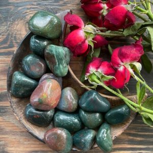 Shop Tumbled Bloodstone Crystals & Pocket Stones! Bloodstone, Bloodstone Tumble, Qty. 1 | Natural genuine stones & crystals in various shapes & sizes. Buy raw cut, tumbled, or polished gemstones for making jewelry or crystal healing energy vibration raising reiki stones. #crystals #gemstones #crystalhealing #crystalsandgemstones #energyhealing #affiliate #ad