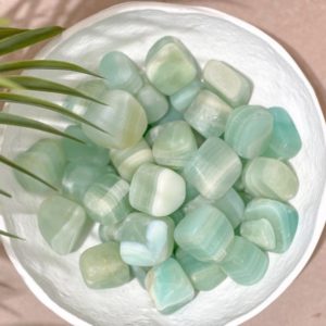 Shop Calcite Stones & Crystals! Pistachio Calcite Tumbled Stones : Nature's Green Wonder | Natural genuine stones & crystals in various shapes & sizes. Buy raw cut, tumbled, or polished gemstones for making jewelry or crystal healing energy vibration raising reiki stones. #crystals #gemstones #crystalhealing #crystalsandgemstones #energyhealing #affiliate #ad