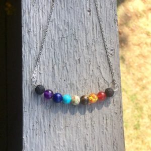 Shop Chakra Beads! Chakra Bead Necklace with Lava Bead Accents for Your Favorite Essential Oil // Matching Chakra Balancing Stretch Bracelet Also Available | Shop jewelry making and beading supplies, tools & findings for DIY jewelry making and crafts. #jewelrymaking #diyjewelry #jewelrycrafts #jewelrysupplies #beading #affiliate #ad