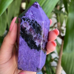 Shop Charoite Points & Wands! Large charoite tower | Natural genuine stones & crystals in various shapes & sizes. Buy raw cut, tumbled, or polished gemstones for making jewelry or crystal healing energy vibration raising reiki stones. #crystals #gemstones #crystalhealing #crystalsandgemstones #energyhealing #affiliate #ad