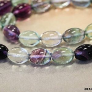 Shop Fluorite Bead Shapes! M/ Fluorite 10x14mm Oval beads 16" strand Rainbow or Light Purple Fluorite beads for jewelry making | Natural genuine other-shape Fluorite beads for beading and jewelry making.  #jewelry #beads #beadedjewelry #diyjewelry #jewelrymaking #beadstore #beading #affiliate #ad