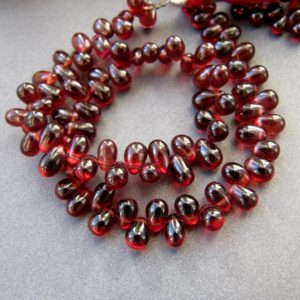 Garnet Tear drops • 5.50-6-7mm • AAA smooth hand polished • Beautiful glowing RED / Not brown • Natural gemstone • Personal Favorite <3 | Natural genuine other-shape Garnet beads for beading and jewelry making.  #jewelry #beads #beadedjewelry #diyjewelry #jewelrymaking #beadstore #beading #affiliate #ad