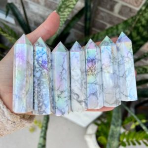 Shop Howlite Points & Wands! Angel aura white howlite tower | Natural genuine stones & crystals in various shapes & sizes. Buy raw cut, tumbled, or polished gemstones for making jewelry or crystal healing energy vibration raising reiki stones. #crystals #gemstones #crystalhealing #crystalsandgemstones #energyhealing #affiliate #ad