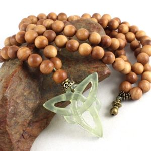Shop Jade Jewelry! Sandalwood Mala Bead Necklace 108 Beads with Jade Celtic Knot Pendant, Mala Necklace Women, Yoga Style Jewelry, Celtic Jewelry, Yoga Gift | Natural genuine Jade jewelry. Buy crystal jewelry, handmade handcrafted artisan jewelry for women.  Unique handmade gift ideas. #jewelry #beadedjewelry #beadedjewelry #gift #shopping #handmadejewelry #fashion #style #product #jewelry #affiliate #ad