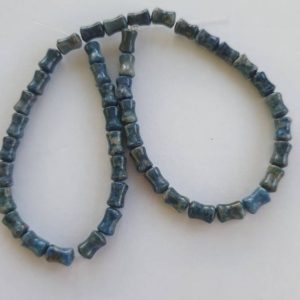Shop Lapis Lazuli Bead Shapes! 44 Natural Lapis Lazuli 9 x 6mm dogbone or bamboo shaped beads. 15 inch strand. | Natural genuine other-shape Lapis Lazuli beads for beading and jewelry making.  #jewelry #beads #beadedjewelry #diyjewelry #jewelrymaking #beadstore #beading #affiliate #ad