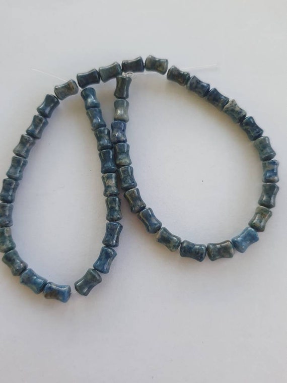 44 Natural Lapis Lazuli 9 X 6mm Dogbone Or Bamboo Shaped Beads. 15 Inch Strand.