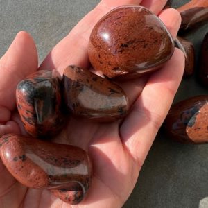 Shop Tumbled Mahogany Obsidian Crystals & Pocket Stones! Large tumbled Mahogany Obsidian | Natural genuine stones & crystals in various shapes & sizes. Buy raw cut, tumbled, or polished gemstones for making jewelry or crystal healing energy vibration raising reiki stones. #crystals #gemstones #crystalhealing #crystalsandgemstones #energyhealing #affiliate #ad