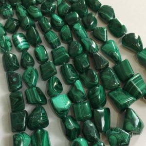 Shop Malachite Chip & Nugget Beads! 17 inch Beautiful natural malachite nuggets,malachite tumbled beads | Natural genuine chip Malachite beads for beading and jewelry making.  #jewelry #beads #beadedjewelry #diyjewelry #jewelrymaking #beadstore #beading #affiliate #ad