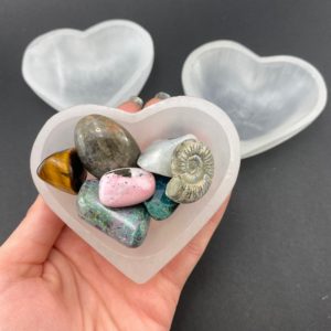 Shop Selenite Shapes! Mini Heart Bowl, Selenite Heart Bowl, Selenite Heart, Selenite Polished Bowl | Natural genuine stones & crystals in various shapes & sizes. Buy raw cut, tumbled, or polished gemstones for making jewelry or crystal healing energy vibration raising reiki stones. #crystals #gemstones #crystalhealing #crystalsandgemstones #energyhealing #affiliate #ad