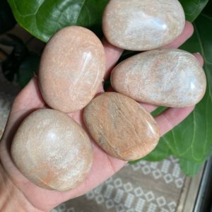 Shop Moonstone Shapes! peach moonstone palm stone, feminine energy | Natural genuine stones & crystals in various shapes & sizes. Buy raw cut, tumbled, or polished gemstones for making jewelry or crystal healing energy vibration raising reiki stones. #crystals #gemstones #crystalhealing #crystalsandgemstones #energyhealing #affiliate #ad