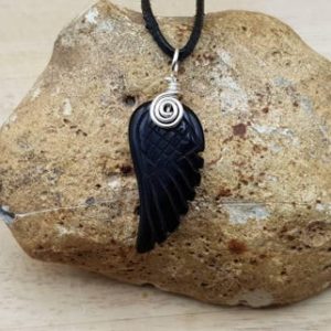 Black Obsidian angel wing pendant necklace. Reiki jewelry uk. Unisex Silver plated Wire wrapped pendant. 30x15mm. Empowered crystals | Natural genuine Gemstone jewelry. Buy crystal jewelry, handmade handcrafted artisan jewelry for women.  Unique handmade gift ideas. #jewelry #beadedjewelry #beadedjewelry #gift #shopping #handmadejewelry #fashion #style #product #jewelry #affiliate #ad
