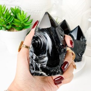 Shop Obsidian Points & Wands! Black Obsidian Crystal Tower: Your Guardian Crystal for a Stylishly Protected Home | Natural genuine stones & crystals in various shapes & sizes. Buy raw cut, tumbled, or polished gemstones for making jewelry or crystal healing energy vibration raising reiki stones. #crystals #gemstones #crystalhealing #crystalsandgemstones #energyhealing #affiliate #ad