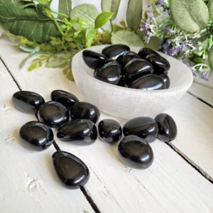 Shop Tumbled Obsidian Crystals & Pocket Stones! Black Obsidian Tumble Stone | Natural genuine stones & crystals in various shapes & sizes. Buy raw cut, tumbled, or polished gemstones for making jewelry or crystal healing energy vibration raising reiki stones. #crystals #gemstones #crystalhealing #crystalsandgemstones #energyhealing #affiliate #ad