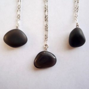 Shop Apache Tears Necklaces! One black obsidian nugget necklace with solid sterling silver chain, Tumble polished apache tears pendant with a shiny or matte surface | Natural genuine Apache Tears necklaces. Buy crystal jewelry, handmade handcrafted artisan jewelry for women.  Unique handmade gift ideas. #jewelry #beadednecklaces #beadedjewelry #gift #shopping #handmadejewelry #fashion #style #product #necklaces #affiliate #ad