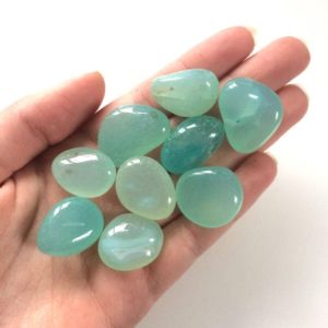 Shop Tumbled Onyx Crystals & Pocket Stones! Onyx blue tumbled stones 15-20-25mm | Natural genuine stones & crystals in various shapes & sizes. Buy raw cut, tumbled, or polished gemstones for making jewelry or crystal healing energy vibration raising reiki stones. #crystals #gemstones #crystalhealing #crystalsandgemstones #energyhealing #affiliate #ad