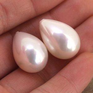 Shop Pearl Bead Shapes! A pair Candy Luster Light Pink Color South Seashell Pearl beads Charm Beads Teardrop Beads | Natural genuine other-shape Pearl beads for beading and jewelry making.  #jewelry #beads #beadedjewelry #diyjewelry #jewelrymaking #beadstore #beading #affiliate #ad