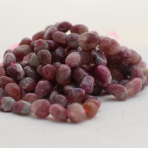 Shop Pink Tourmaline Beads! High Quality Grade A Natural Pink Tourmaline Semi-precious Gemstone Pebble Tumbled stone Nugget Beads 7mm-10mm – 15" strand | Natural genuine beads Pink Tourmaline beads for beading and jewelry making.  #jewelry #beads #beadedjewelry #diyjewelry #jewelrymaking #beadstore #beading #affiliate #ad