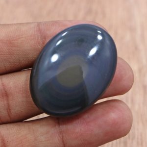Shop Obsidian Cabochons! Beautiful Black Rainbow Obsidian Ornamental Gemstone 28*37 MM Flat Back Cabochon Rainbow Obsidian 60.35 Cts Oval Cut Rainbow Obsidian Stone | Natural genuine stones & crystals in various shapes & sizes. Buy raw cut, tumbled, or polished gemstones for making jewelry or crystal healing energy vibration raising reiki stones. #crystals #gemstones #crystalhealing #crystalsandgemstones #energyhealing #affiliate #ad