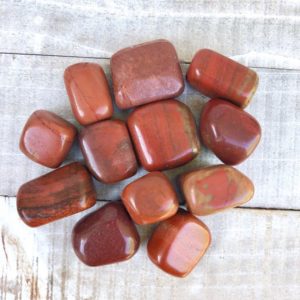 Shop Red Jasper Stones & Crystals! Tumbled Red Jasper Polished Stone | Natural genuine stones & crystals in various shapes & sizes. Buy raw cut, tumbled, or polished gemstones for making jewelry or crystal healing energy vibration raising reiki stones. #crystals #gemstones #crystalhealing #crystalsandgemstones #energyhealing #affiliate #ad