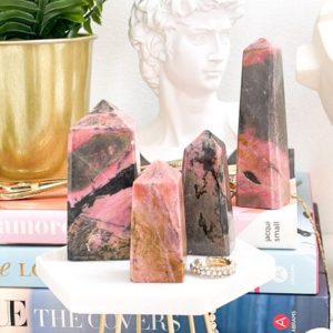 Rhodonite Crystal Towers: The Ultimate Generator for Emotional Healing and Balancing | Natural genuine stones & crystals in various shapes & sizes. Buy raw cut, tumbled, or polished gemstones for making jewelry or crystal healing energy vibration raising reiki stones. #crystals #gemstones #crystalhealing #crystalsandgemstones #energyhealing #affiliate #ad