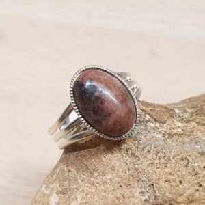 Shop Rhodonite Rings! Rhodonite ring. Silver plated adjustable rings for women. Reiki jewelry uk. Taurus jewelry | Natural genuine Rhodonite rings, simple unique handcrafted gemstone rings. #rings #jewelry #shopping #gift #handmade #fashion #style #affiliate #ad