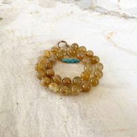 Golden Rutile Rutilated Quartz Round Beaded Necklace With Handmade Sleeping Beauty Turquoise Toggle Clasp | Natural genuine Gemstone jewelry. Buy crystal jewelry, handmade handcrafted artisan jewelry for women.  Unique handmade gift ideas. #jewelry #beadedjewelry #beadedjewelry #gift #shopping #handmadejewelry #fashion #style #product #jewelry #affiliate #ad
