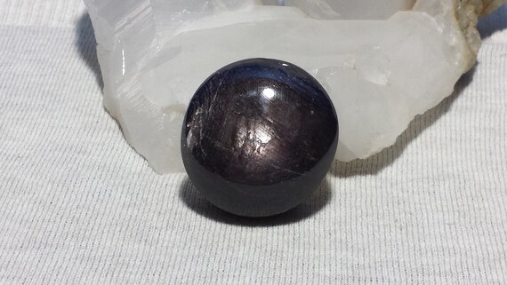 Natural Sapphire Oval Cabochon Black & Purple With Asterism And Unique Markings 45mm X 42.8mm X 23.9mm 516cts. Corundum Sapphire Cabochon