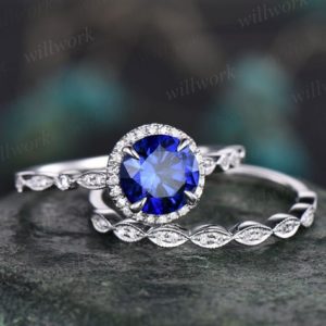 Shop Unique Sapphire Engagement Rings! Art deco sapphire engagement ring set vintage halo Milgrain diamond ring white gold marquise ring setting women September birthstone ring | Natural genuine Sapphire rings, simple unique alternative gemstone engagement rings. #rings #jewelry #bridal #wedding #jewelryaccessories #engagementrings #weddingideas #affiliate #ad