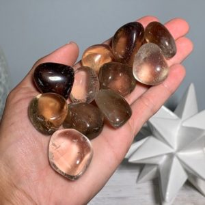 Shop Tumbled Smoky Quartz Crystals & Pocket Stones! India Smoky Quartz, Tumbled Smoky Quartz, Smokey Quartz, Tumbled Smokey Quartz | Natural genuine stones & crystals in various shapes & sizes. Buy raw cut, tumbled, or polished gemstones for making jewelry or crystal healing energy vibration raising reiki stones. #crystals #gemstones #crystalhealing #crystalsandgemstones #energyhealing #affiliate #ad