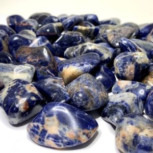 Shop Sodalite Stones & Crystals! Orange Sodalite Tumbled Stones | Natural genuine stones & crystals in various shapes & sizes. Buy raw cut, tumbled, or polished gemstones for making jewelry or crystal healing energy vibration raising reiki stones. #crystals #gemstones #crystalhealing #crystalsandgemstones #energyhealing #affiliate #ad