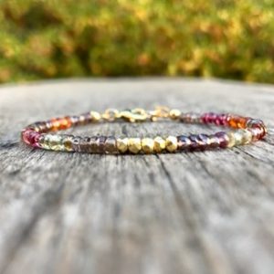 Shop Spinel Bracelets! Dainty 24K Gold Vermeil Sterling Silver and Multicolor Spinel Wire And Clasp Bracelet 4mm 24K Gold & 4mm Rondelle Faceted Spinel Bracelet | Natural genuine Spinel bracelets. Buy crystal jewelry, handmade handcrafted artisan jewelry for women.  Unique handmade gift ideas. #jewelry #beadedbracelets #beadedjewelry #gift #shopping #handmadejewelry #fashion #style #product #bracelets #affiliate #ad