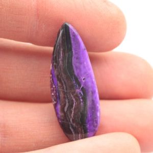 Shop Sugilite Stones & Crystals! Top purple sugilite cabochon / sugilite south africa | Natural genuine stones & crystals in various shapes & sizes. Buy raw cut, tumbled, or polished gemstones for making jewelry or crystal healing energy vibration raising reiki stones. #crystals #gemstones #crystalhealing #crystalsandgemstones #energyhealing #affiliate #ad