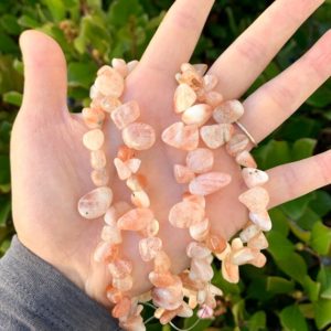 Shop Sunstone Bead Shapes! 1 Strand/15" Natural Gold Sheen Sunstone Healing Gemstone Free Form Teardrop Briolette 10-20mm Pendant Drop Bead for Earrings Jewelry Making | Natural genuine other-shape Sunstone beads for beading and jewelry making.  #jewelry #beads #beadedjewelry #diyjewelry #jewelrymaking #beadstore #beading #affiliate #ad