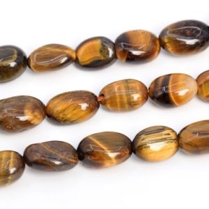 Shop Tiger Eye Chip & Nugget Beads! 8-10MM Yellow Tiger Eye Beads Pebble Nugget Grade A Genuine Natural Gemstone Loose Beads 15.5" /7.5"Bulk Lot Options (108561) | Natural genuine chip Tiger Eye beads for beading and jewelry making.  #jewelry #beads #beadedjewelry #diyjewelry #jewelrymaking #beadstore #beading #affiliate #ad