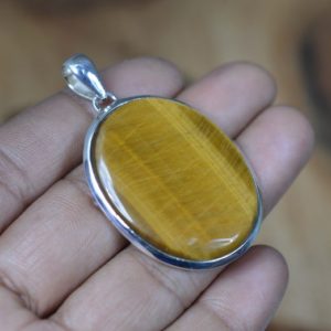 Shop Tiger Eye Pendants! Tiger Eye 925 Sterling Silver Oval Shape Gemstone Pendant | Natural genuine Tiger Eye pendants. Buy crystal jewelry, handmade handcrafted artisan jewelry for women.  Unique handmade gift ideas. #jewelry #beadedpendants #beadedjewelry #gift #shopping #handmadejewelry #fashion #style #product #pendants #affiliate #ad