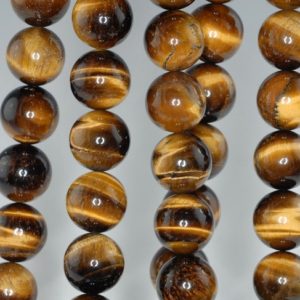 Shop Tiger Eye Round Beads! 14mm Cognac Tiger Eye Gemstone Grade A Yellow Round Loose Beads 15.5 inch Full Strand (90186188-734) | Natural genuine round Tiger Eye beads for beading and jewelry making.  #jewelry #beads #beadedjewelry #diyjewelry #jewelrymaking #beadstore #beading #affiliate #ad
