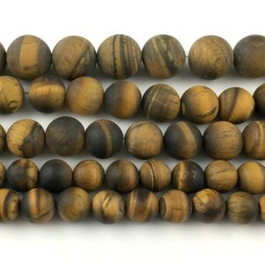 Shop Tiger Eye Round Beads! Yellow Tiger Eye Matte Beads, Natural Gemstone Beads, Round Stone Beads 4mm 6mm 8mm 10mm 12mm | Natural genuine round Tiger Eye beads for beading and jewelry making.  #jewelry #beads #beadedjewelry #diyjewelry #jewelrymaking #beadstore #beading #affiliate #ad