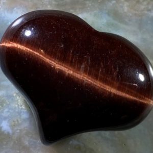 Shop Tiger Eye Shapes! Red Tigers Eye Puffy Heart Pocket, Worry Healing Stone with Positive Healing Energy! | Natural genuine stones & crystals in various shapes & sizes. Buy raw cut, tumbled, or polished gemstones for making jewelry or crystal healing energy vibration raising reiki stones. #crystals #gemstones #crystalhealing #crystalsandgemstones #energyhealing #affiliate #ad