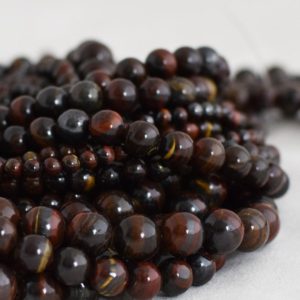 Shop Tiger Iron Beads! Red Iron Tiger Eye Round Beads – 4mm, 6mm, 8mm, 10mm sizes – 15" Strand – Natural Semi-precious Gemstone | Natural genuine round Tiger Iron beads for beading and jewelry making.  #jewelry #beads #beadedjewelry #diyjewelry #jewelrymaking #beadstore #beading #affiliate #ad