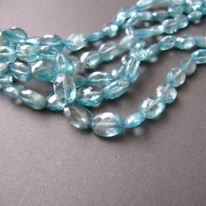 Shop Zircon Beads! Blue Zircon Ovals • 5×3 to 7.75x6mm • AA+ Micro Faceted Oval Nuggets Beads • Natural Genuine Gemstone • Vivid Blue Natural Colour • Gorgeous | Natural genuine chip Zircon beads for beading and jewelry making.  #jewelry #beads #beadedjewelry #diyjewelry #jewelrymaking #beadstore #beading #affiliate #ad