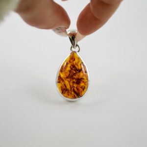 Shop Amber Pendants! Simple Teardrop Amber Pendant // Amber Jewelry // Silver Jewelry // Sterling Silver // Village Silversmith | Natural genuine Amber pendants. Buy crystal jewelry, handmade handcrafted artisan jewelry for women.  Unique handmade gift ideas. #jewelry #beadedpendants #beadedjewelry #gift #shopping #handmadejewelry #fashion #style #product #pendants #affiliate #ad