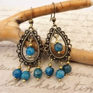 Shop Apatite Earrings! Chandelier Earrings with Blue Apatite Faceted Cubes and Antique Brass, Luxe, Gift, Romantic, One of a Kind | Natural genuine Apatite earrings. Buy crystal jewelry, handmade handcrafted artisan jewelry for women.  Unique handmade gift ideas. #jewelry #beadedearrings #beadedjewelry #gift #shopping #handmadejewelry #fashion #style #product #earrings #affiliate #ad
